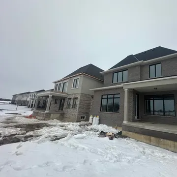 Stone accent and stucco combination exterior