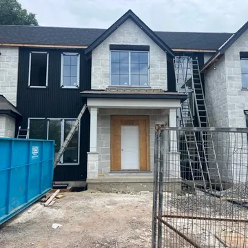 Stone accent and stucco combination exterior