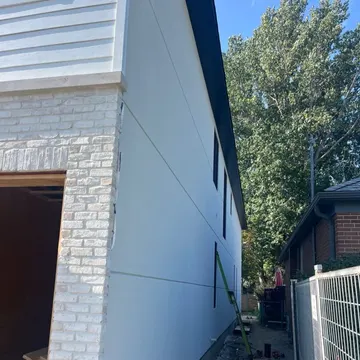 Stone accent and stucco combination exterior